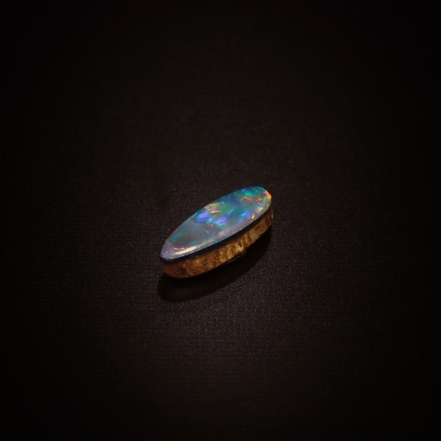 Oval Black Triplet Opal 0.2ct