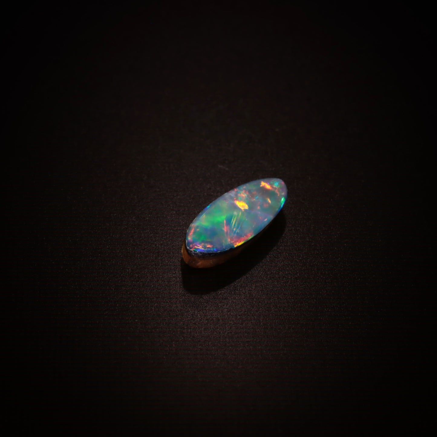 Oval Black Triplet Opal 0.2ct